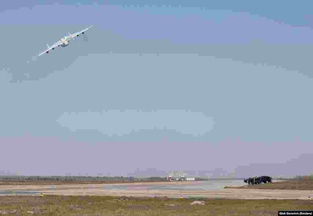 The An-225 swooping through a clear spring sky above Kyiv on April 23. Vitaliy Shost, the deputy director of Antonov Airlines, told RFE/RL the plane makes an average of 12 to 20 flights each year, but so far in 2020 it has already completed seven international deliveries.&nbsp;