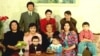 A file photo of Nursultan Nazarbaev (center) and his family in 1992. A lot of the former Kazakh president's relatives attained great wealth and power during his time at the helm. 