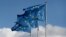 European Union flags fly outside the EU Commission headquarters in Brussels (file photo)