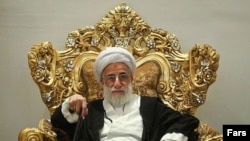 Iran Guardian Council head Ahmad Janati in Iraq, undated