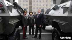 Azerbaijani President Ilham Aliyev, opening a military base in September, is up for reelection in October.