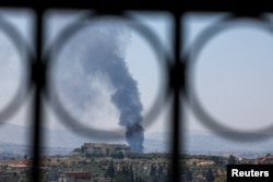 Smoke billows from southern Lebanon following Israeli strikes reported by local residents on June 17.