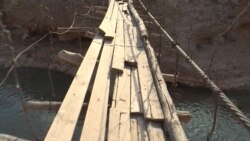Tajik Children Brave Treacherous Bridge To School
