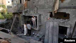 Prizor nakon granatiranja Pojasa Gaze, 12. juli