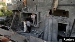 Zgrada oštećena tokom izraelskog bombardovanja