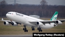 GERMANY -- An Airbus A340-300 of Iranian airline Mahan Air takes off from Duesseldorf airport DUS, Germany January 16, 2019