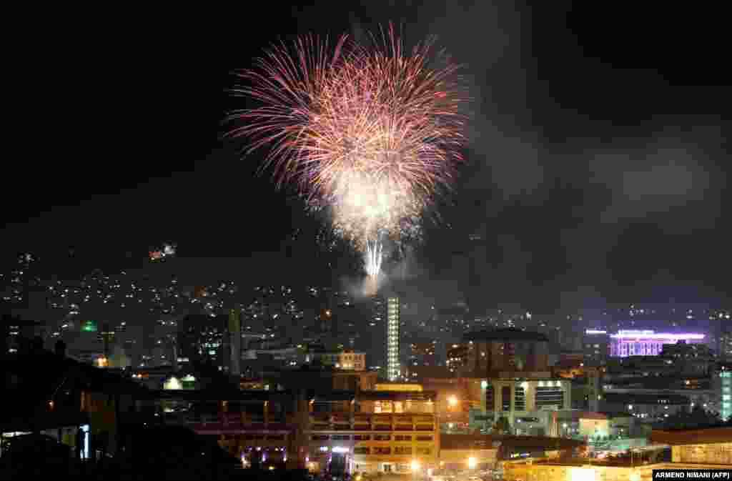 Fireworks illuminate Pristina&#39;s skyline as Kosovo celebrates five years since its declaration of independence. (AFP/Armend Nimani)