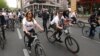 Armenia - Opposition leader Zaruhi Postanjian leads a pre-election bycicle ride through downtown Yerevan, 21Apr2017.