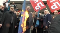 Serb War-Crimes Suspect Burns EU, NATO Flags In Belgrade