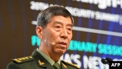 Fostul ministru chinez al apărării, Li Shangfu, în timpul unui discurs la Summitul de la Shangri-La, din Singapore, 4 iunie 2023.