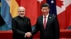 FILE: Chinese President Xi Jinping (R) shakes hands with Indian Prime Minister Narendra Modi during the G20 Summit in Hangzhou in September 2016.