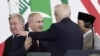 Egypt - U.S. President Donald Trump cuts short a conversation with Armenian Prime Minister Nikol Pashinian at a summit in Sharm el-Sheikh, October 13, 2025.