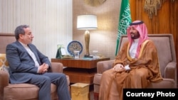 Iranian Foreign Minister Abbas Araqchi (left) meets with Saudi Crown Prince Muhammad bin Salman in Riyadh on October 9.