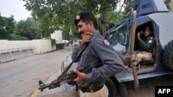 Pakistani security personnel guard the U.S. Consulate in Lahore this past week.