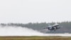 An F-16CM fighter jet takes off from Kallax Airport outside Lulea in northern Sweden.