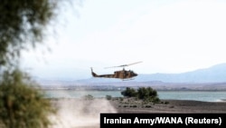 A helicopter is seen during an Iranian Army exercise dubbed "Fatehan of Kheibar", in the northwestern parts of Iran, in this picture obtained on October 1, 2021.