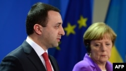 Ираклий Гарибашвили и Ангела Меркель (архивная фотография)
