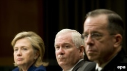 U.S. Secretary of State Hillary Clinton (left), Defense Secretary Robert Gates (center), and Chairman of the Joint Chiefs of Staff Michael Mullen participate in a Senate Armed Services Committee hearing in Washington, D.C.