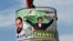 A Pakistani policeman stands guard on top of a water tank during an election campaign meeting by cricket legend and Pakistan Tehrik-e Insaaf party leader Imran Khan in the northwestern town of Mansehra on May 3.