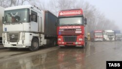 Russia -- In Russia the movement of trucks from Ukraine is prohibited, except in transit to Kazakhstan