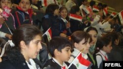 أطفال عراقيون يحتفلون بيومهم في بغداد