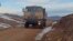 An Azerbaijani military vehicle moves along a road in the Kalbacar region on November 25.