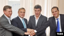 From left to right, Ryzhkov, Kasyanov, Nemtsov, and Milov.