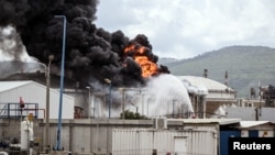 Israel said that an industrial building and a fuel tanker at oil refineries in Haifa were hit by debris from an intercepted Iranian missile on March 30.