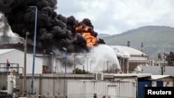 An industrial building and fuel tanker at Israel's oil refinery in Haifa were hit by debris from an intercepted Iranian missile on March 30. 