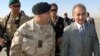 Italian Defense Minister Arturo Parisi (right) with General Natalino Madeddu, commander in chief of Italian forces in Iraq (file photo)