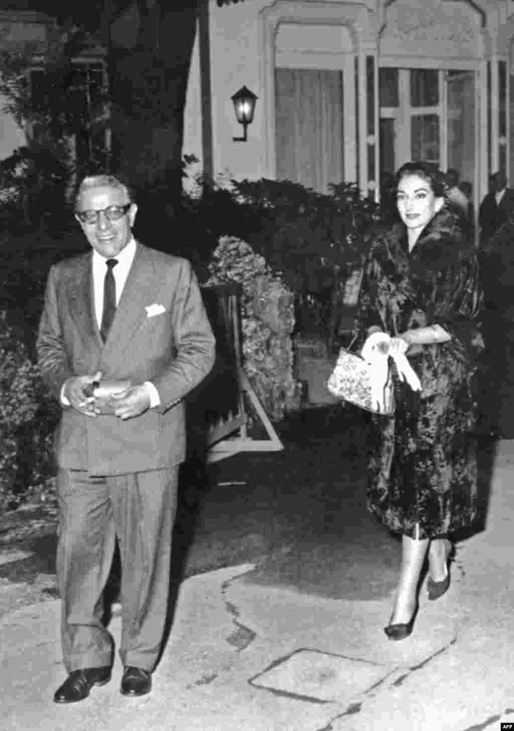 Callas leaving a nightclub in Milan with her companion, Greek shipping magnate Aristotle Onassis, on September 6, 1959