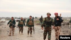 Pamje e pjesëtarëve të luftëtarëve kurdë në Irak të njohur me emrin Peshmerga 