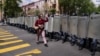 An Armenian woman confronts a line of riot police on Yerevan's main avenue: "I'm a journalist but before I'm a journalist I'm a citizen, and before you are police you are all citizens of Armenia!"