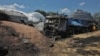 A view shows barley and a damaged truck where a grain warehouse was destroyed by a Russian missile strike at the compound of an agricultural company in the village of Pavlivka, Odesa region, Ukraine, on July 21. 