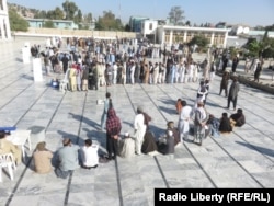Afghans lined up to vote in eastern Khost Province on October 20.