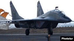 Armenia - A Russian MiG-29 fighter jet lands at Erebuni airport in Yerevan, 14Mar2014.