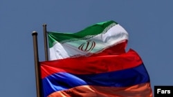 Iran/Armenia – Geopolitics – The flags of Armenia and Iran, Tehran, July 2006