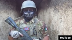 A screen grab from a video that purportedly shows Vladimir Verbitsky (aka "Parma") involved with separatists in eastern Ukraine. He has since been arrested by the Italian police. 