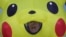 Një demonstrues me kostum të personazhit të animuar, Pikachu, derisa&nbsp; aktivistët globalë mjedisorë protestojnë kundër industrisë së gazit gjatë Konferencës së Kombeve të Bashkuara për Ndryshimet Klimatike (COP29) në Baku.