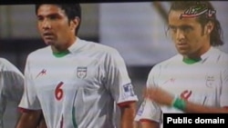 Iran's national soccer team players in World Cup qualifier v. South Korea in Seoul on 17jun2009.Green waistband is seen on one player.