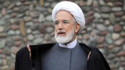 Former reformist parliament speaker Mehdi Karrubi speaks during a press conference in Tehran in 2008, before his presidential run and house arrest.