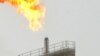 Газовый факел на нефтепромысле