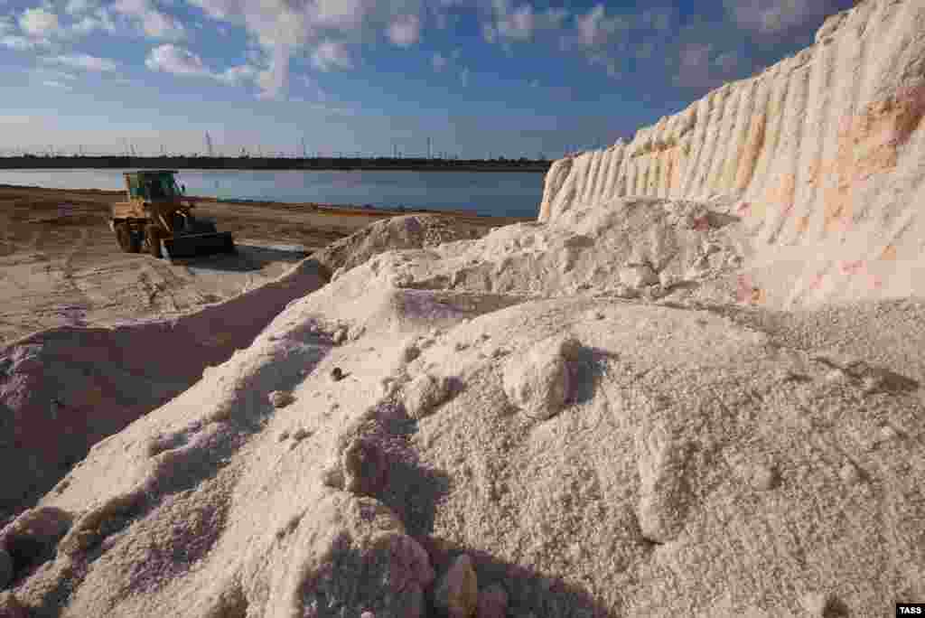 Mounds of salt at the production site. Annual production varies, but on average some 10,000 tons of salt are collected each year.