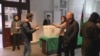 Azerbaijan - election observers facing off with officials at a polling station - screen grab