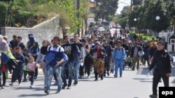 Мигранти на грчкиот остров Хиос. 