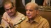 FILE: Shahbaz Sharif (R), leader of the opposition, also heads the Pakistan Muslim League, addresses a news conference in Lahore in July.
