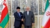 FILE PHOTO - Iranian Foreign Minister Mohammad Javad Zarif (R) meets with Oman's Minister of State for Foreign Affairs Yusuf bin Alawi bin Abdullah in Tehran, December 2, 2019