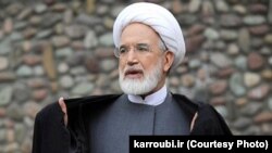 Former reformist parliament speaker Mehdi Karrubi speaks during a press conference in Tehran in 2008, before his presidential run and house arrest.