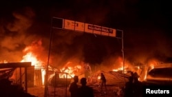 Пожар после израильского удара по Рафаху, 26 мая 2024 года