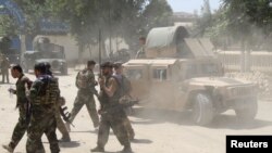 Афганский спецназ в районе столкновения с талибами в афганской провинции Кундуз, 22 июня 2021 года.